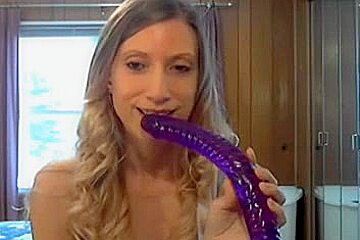 This Babe takes a giant sex-toy in her wazoo