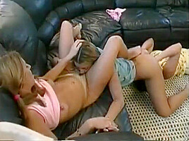 Three Experienced Lesbian teens 18+ Lick Each Other On The Sofa In The Living Room