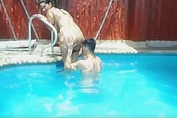 Three guys and one girl fuck in the pool