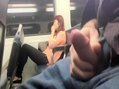 Train passenger can't believe what the guy next to her is doing!