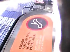 Upskirt milf escalator