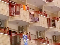 Upskirt of a neighbor at a balcony
