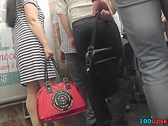 Upskirt porn with a skinny ass gal in a public place