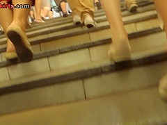 Upskirt porn with amateur brunette in a public place