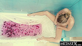 Watch This Busty Blonde Beauty Masturbating In The Bathtub