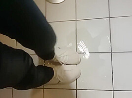 Wetlook fully clothed in shower