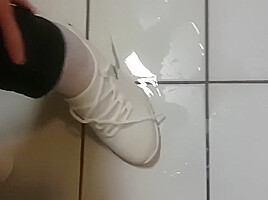 Wetlook fully clothed in shower