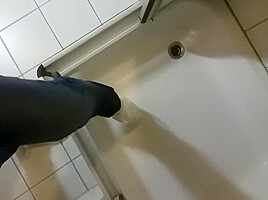 Wetlook fully clothed in shower
