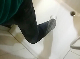 Wetlook fully clothed in shower