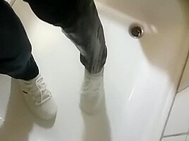 Wetlook fully clothed in shower