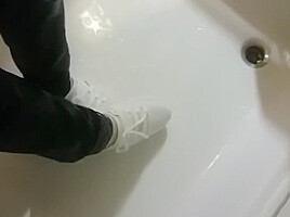 Wetlook fully clothed in shower