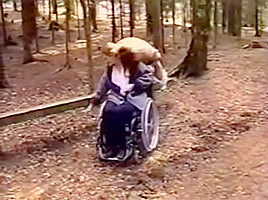 Wheelchair girl outdoor fun