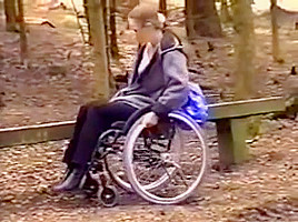 Wheelchair girl outdoor fun
