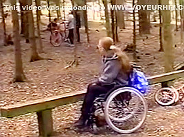 Wheelchair girl outdoor fun