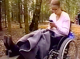 Wheelchair girl outdoor fun