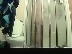 Wife spied in bathroom by