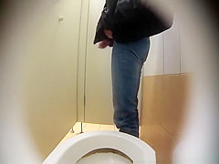 Woman spied in public toilet