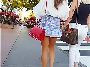 candid gorgeous model in blue ruffle skirt
