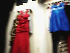 dressing room video with female trying on new dress