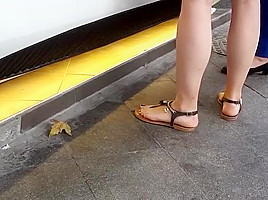 girl sexy long feets red pedicured toes