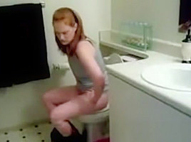 on toilet girl