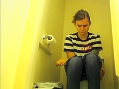 teen 18+ chick pulls down her tight jeans pants to pee
