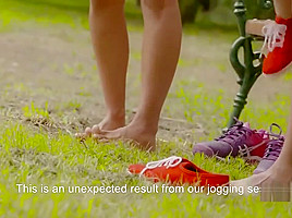 two girls play less together outside the park