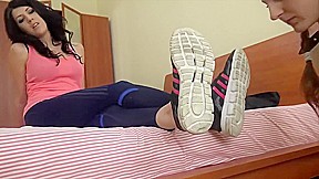 under girls feet - slut licks her mistress's feet