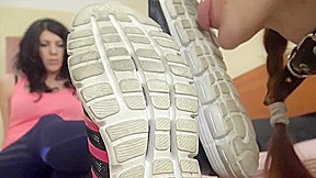 under girls feet - slut licks her mistress's feet